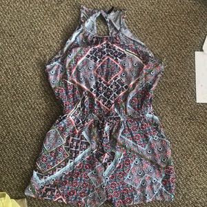Romper. Never been worn.